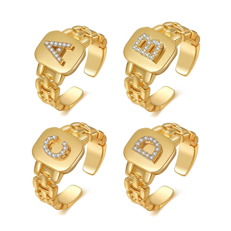 Anillo de letras chapadas de oro de cobre al por mayor